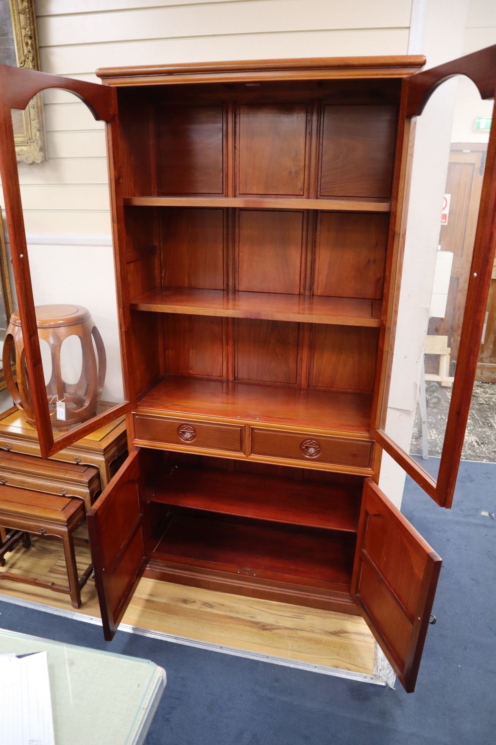 A Chinese hardwood cabinet, width 92cm, depth 35cm, height 183cm